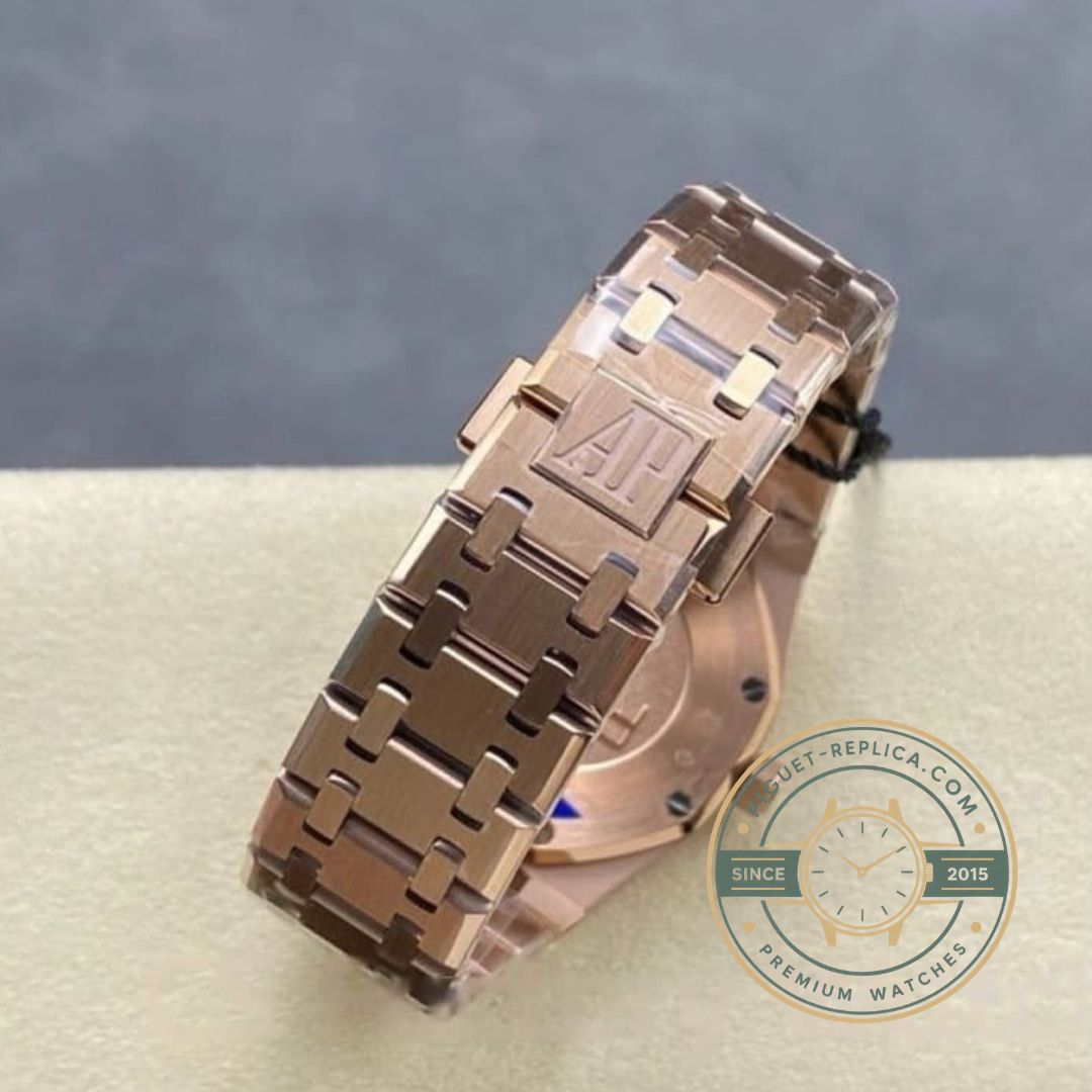 Replica Audemars Piguet Royal Oak 67651OR.ZZ.1261OR.02 33mm rose gold watch with diamond bezel