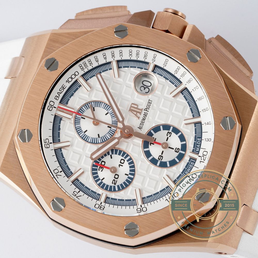 Audemars Piguet replica watch with an 18K rose gold case, white dial and matching rubber strap
