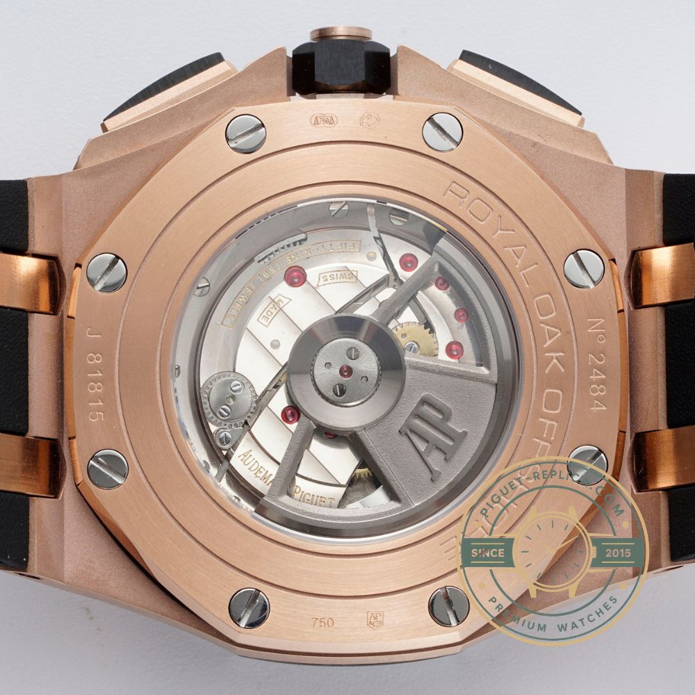 Audemars Piguet replica watch with a grey dial, rose gold case elements and grey rubber strap